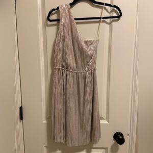 Champagne shimmer one shoulder dress.